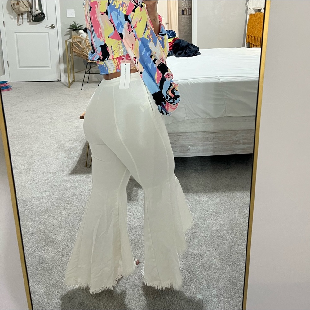 White flare jeans